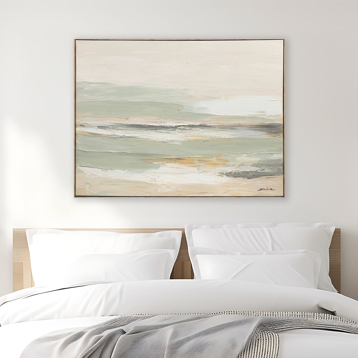 Abstract painting above a bed in a bedroom setting