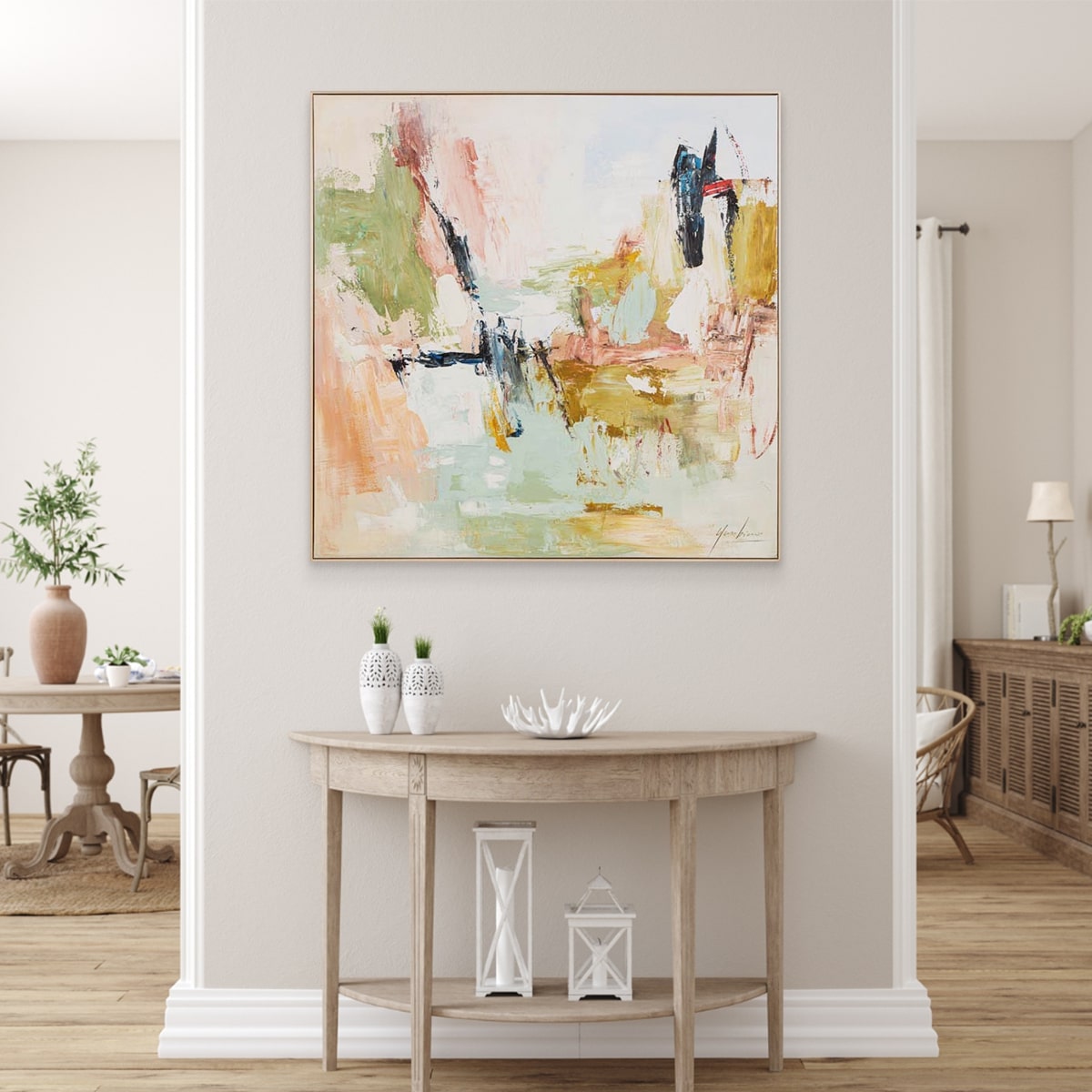 Bloom In Sage abstract oil painting on a wall above a wooden console table in a living room.