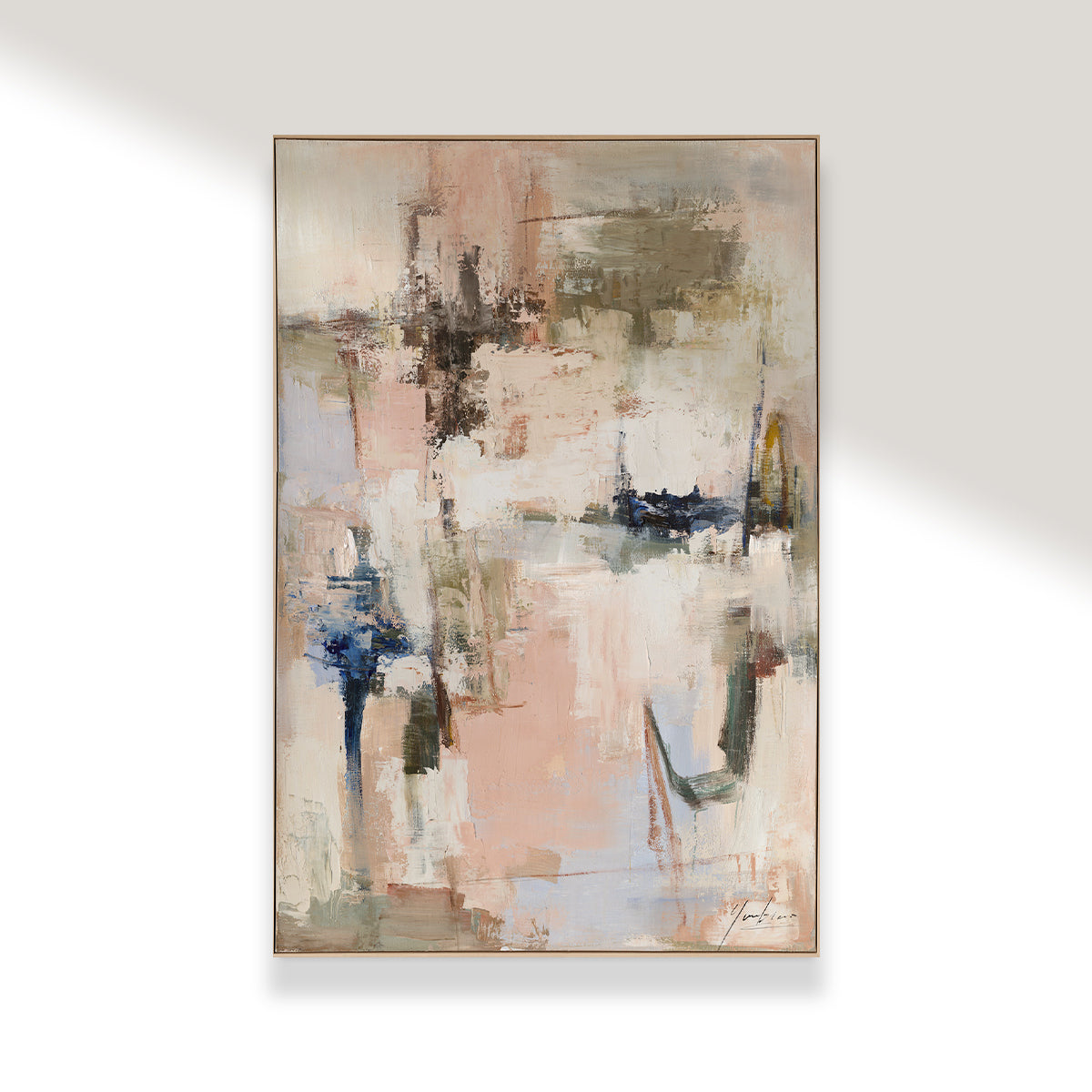 Abstract painting with soft colors on a white wall