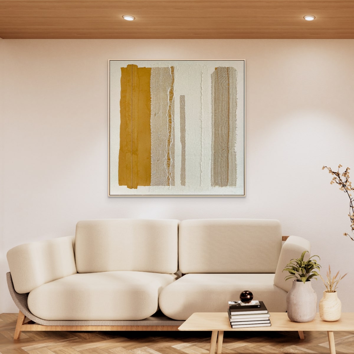 Modern living room with Plentiful abstract art hung above a beige sofa.