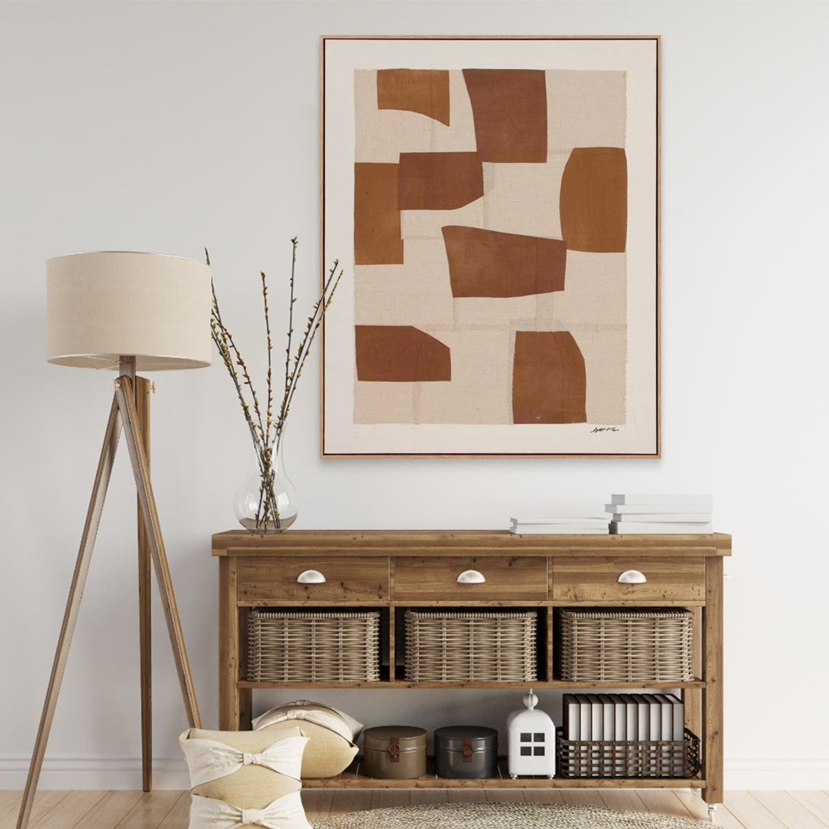 Umber abstract wall art hung up in a living room with a wooden sideboard and decorative items.