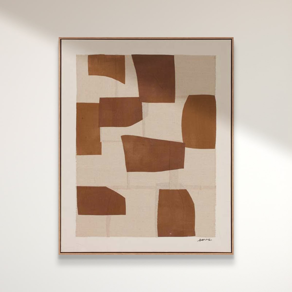Umber abstract art piece with brown and beige blocks striking against a light background.