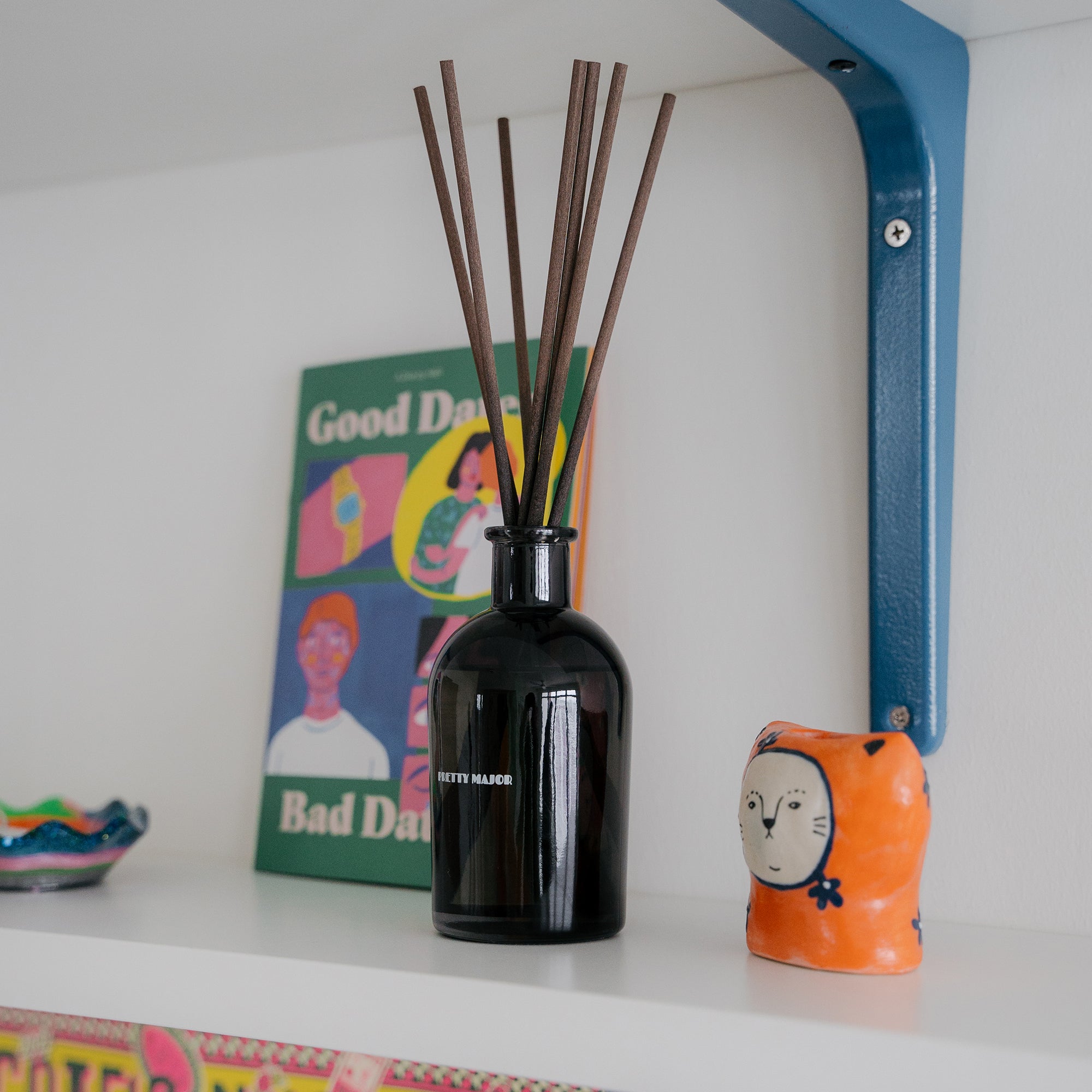 reed diffuser on shelf