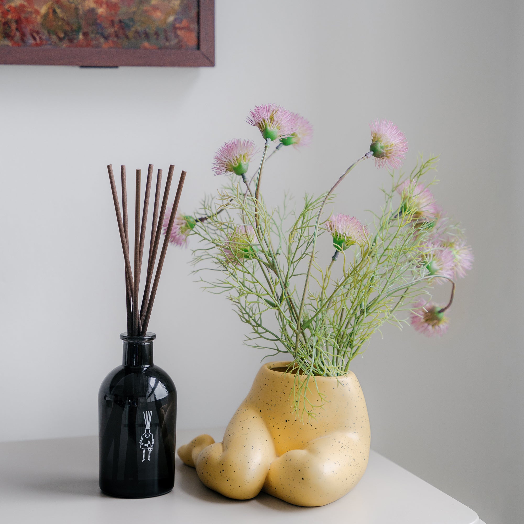 reed diffuser on tv console