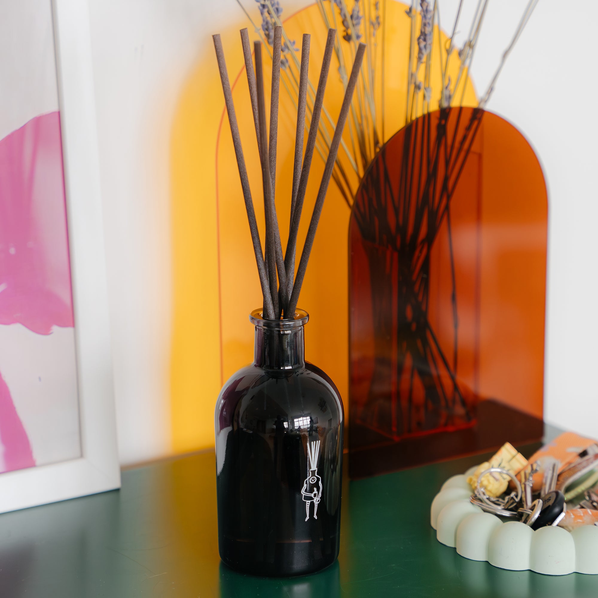 reed diffuser on shelf home entryway