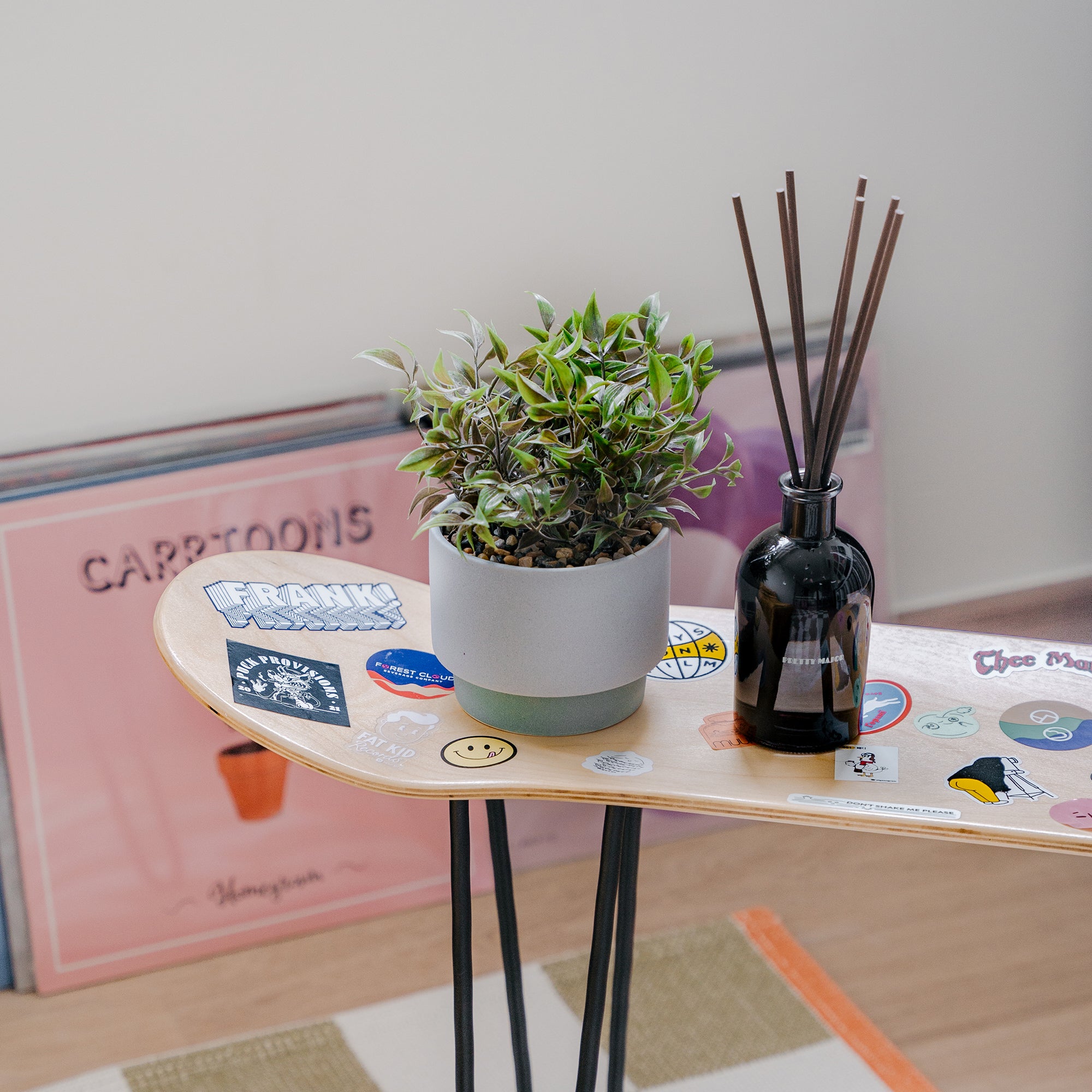 reed diffuser on table in music room
